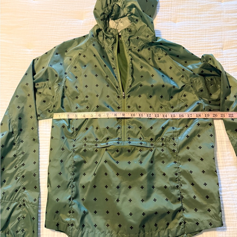 oiselle Green Hooded Windbreaker with Black Cross Print